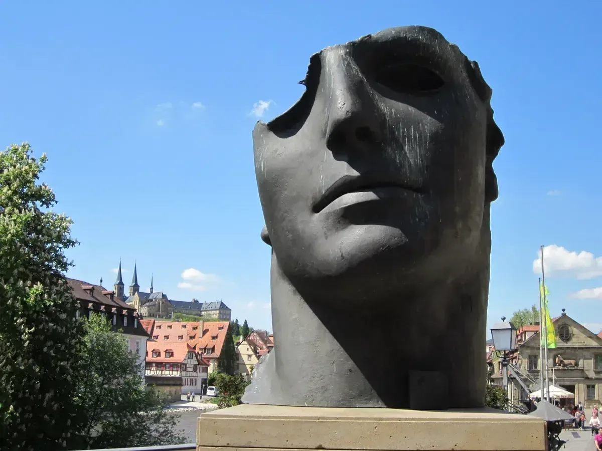 Igor Mitoraj Centurione I monumental bronze sculpture with Michaelsberg Abbey, Bamberg Germany — permanent public installation