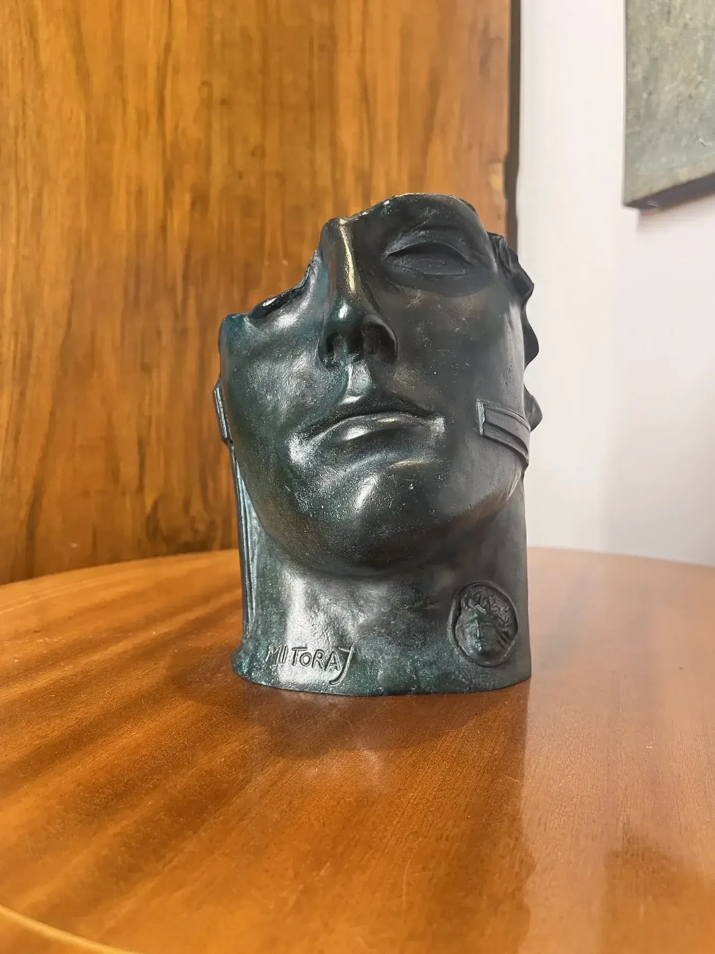 Centurione II (1987) — Igor Mitoraj, dark patina bronze, angled view, horizontal band motif visible