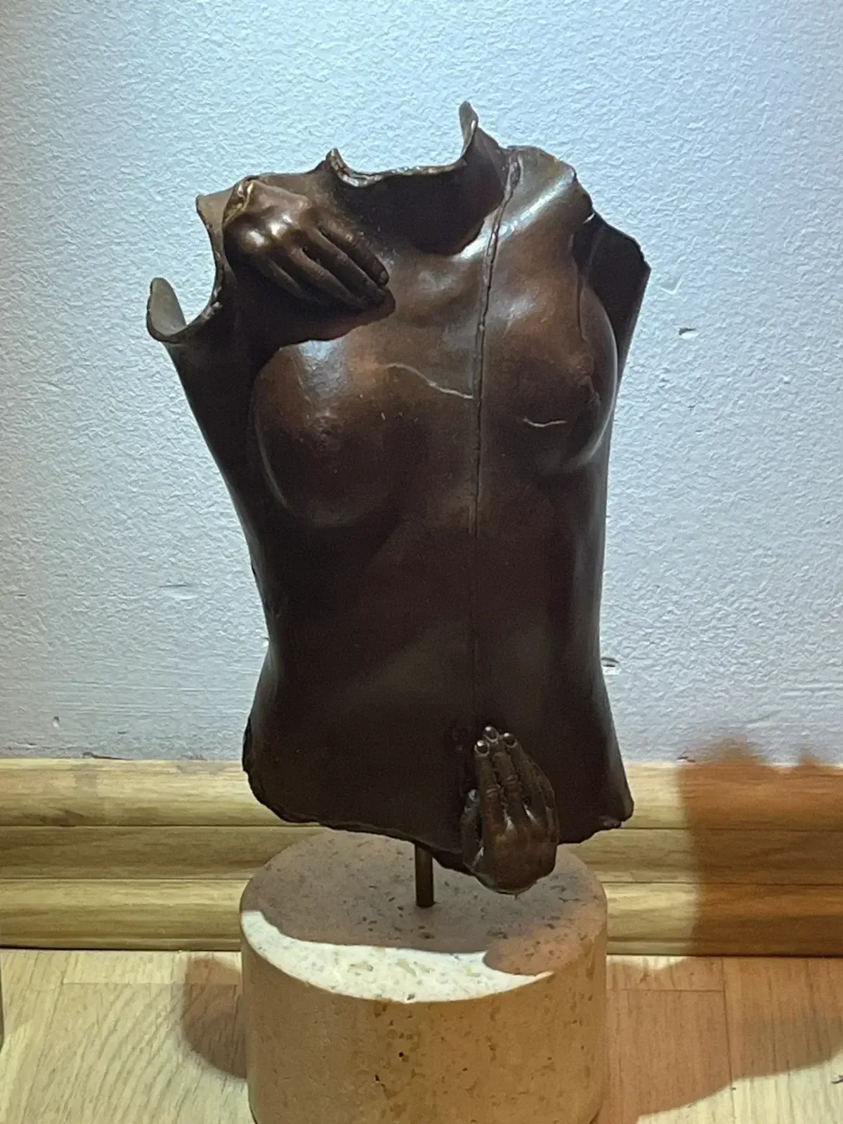 Kea (1979) — Igor Mitoraj, bronze torso, front view with neutral background
