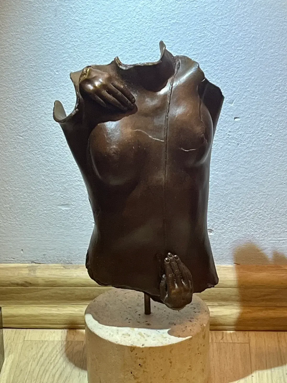 Kea (1979) — Igor Mitoraj, bronze torso, three-quarter view, dark patina