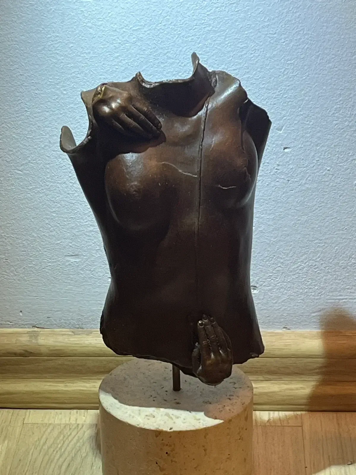 Kea (1979) — Igor Mitoraj, bronze torso, right profile view, dark patina