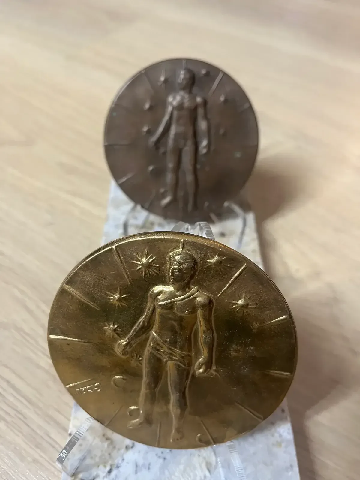 Artcurial Mitoraj medals — overhead view