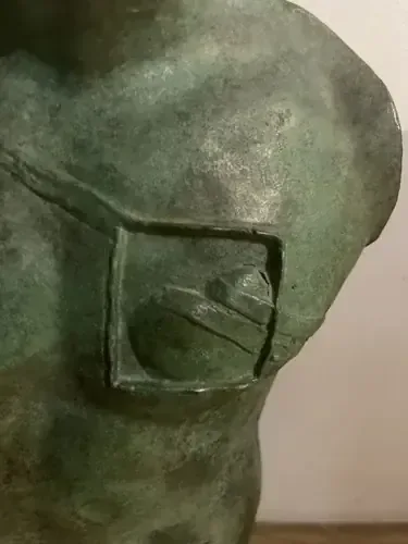 Persée (1988) — Igor Mitoraj, green patina bronze, detail of face and helmet, private collection