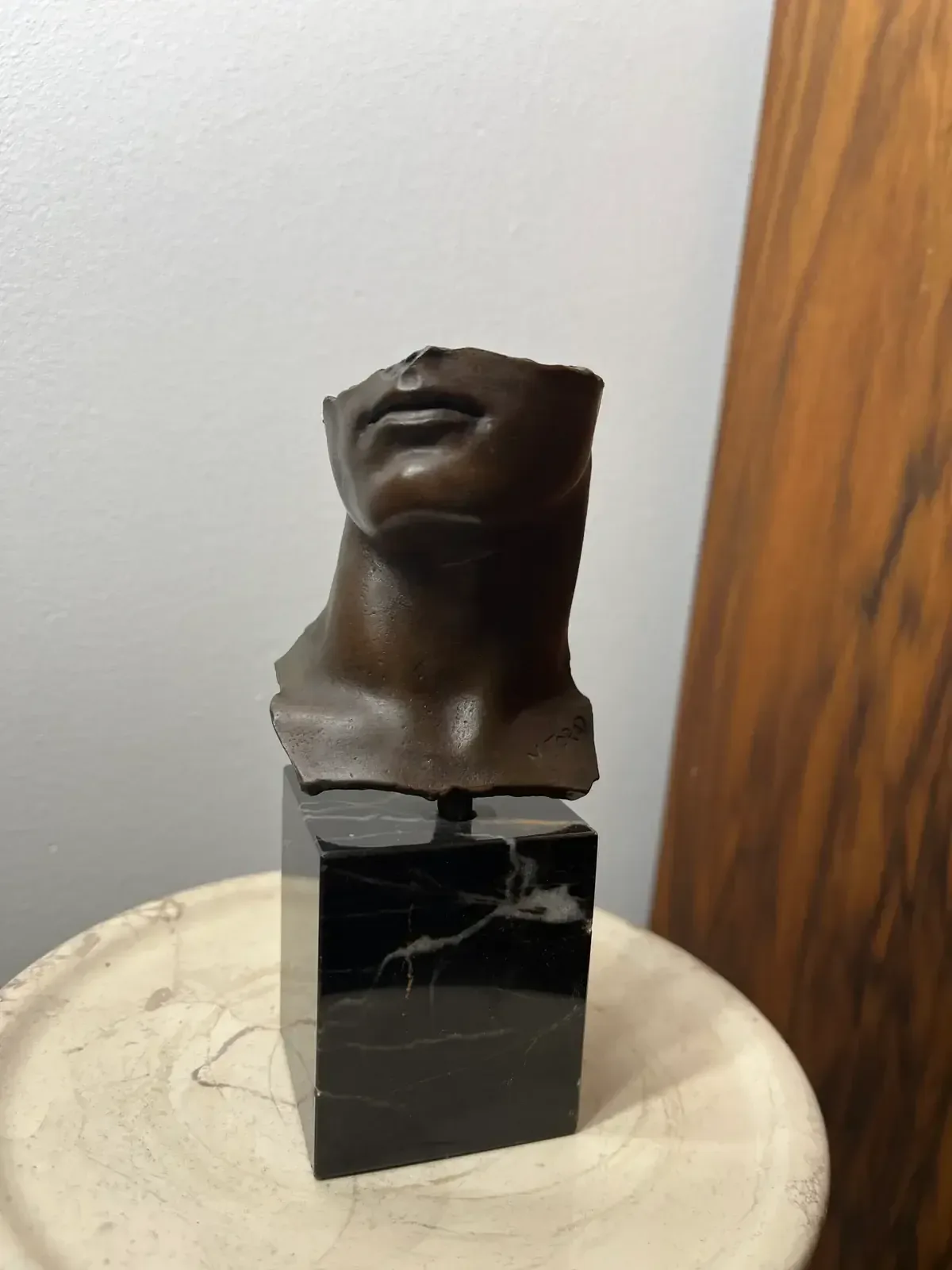 Portrait d'Homme (1984) — Igor Mitoraj, bronze, medal patina, angled front view