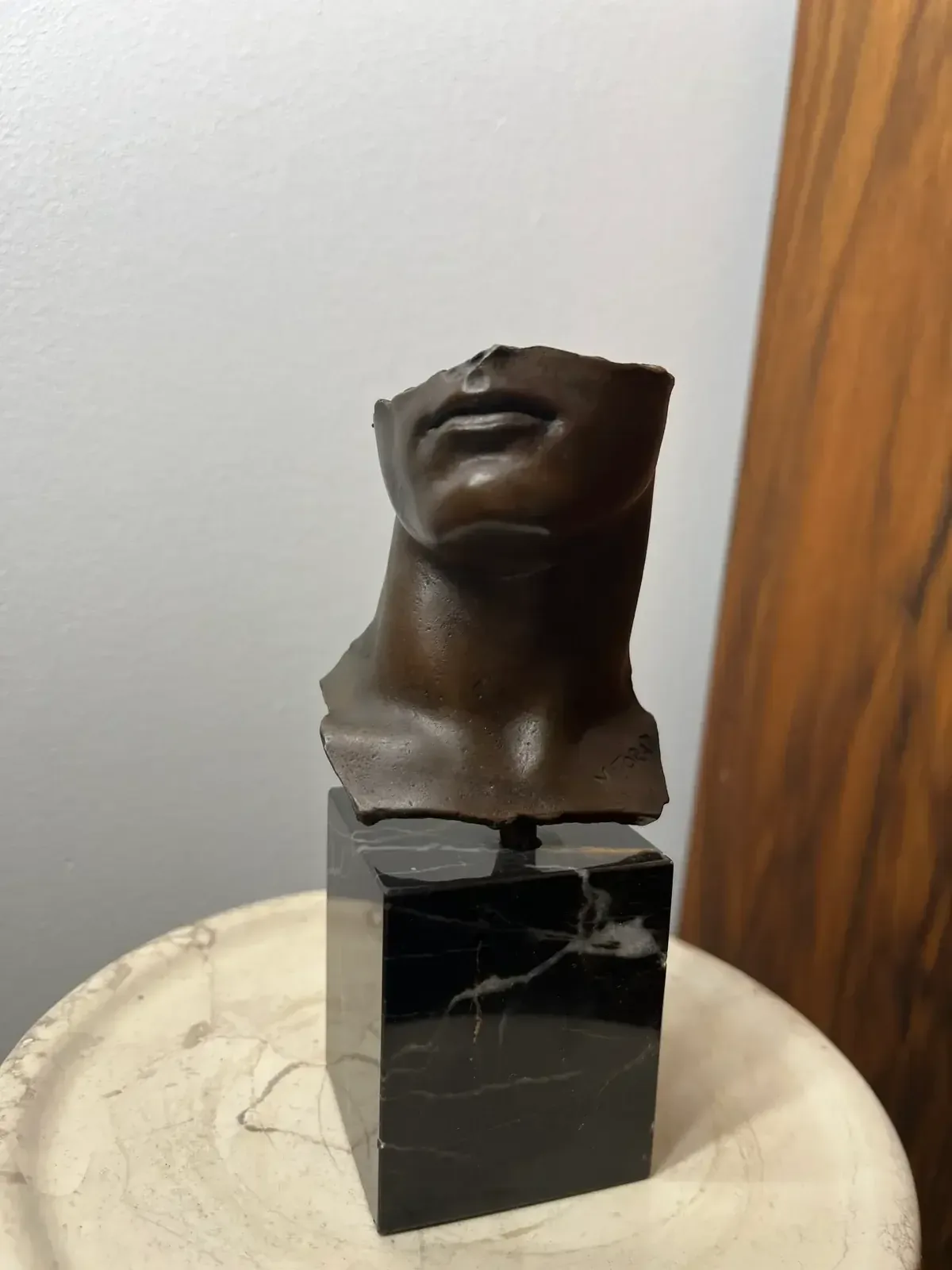 Portrait d'Homme (1984) — Igor Mitoraj, bronze, medal patina, angled view from below