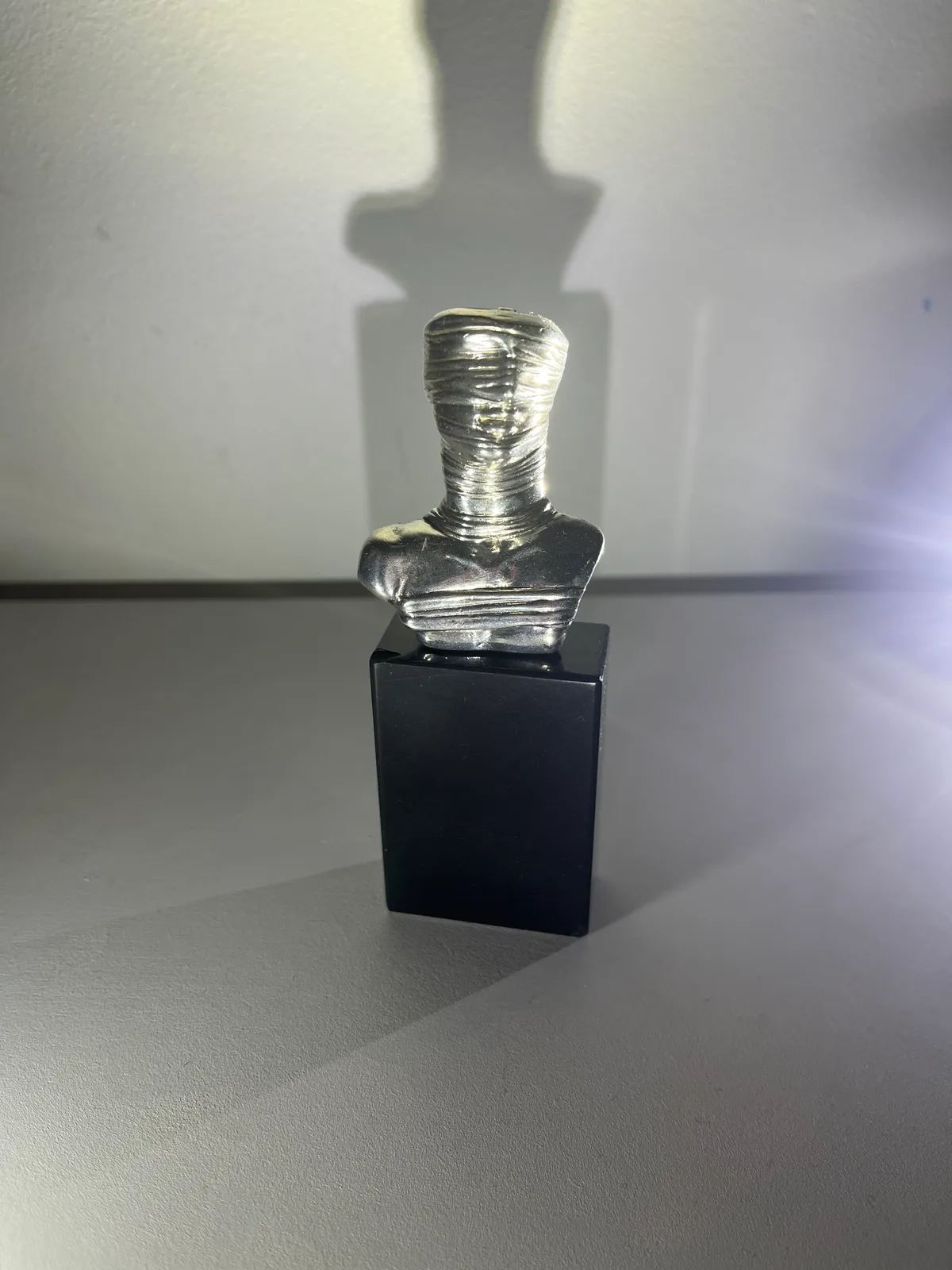 Petit Prométhée Argent ed. 5/8 — front view on plinth, Igor Mitoraj, Artcurial 1981