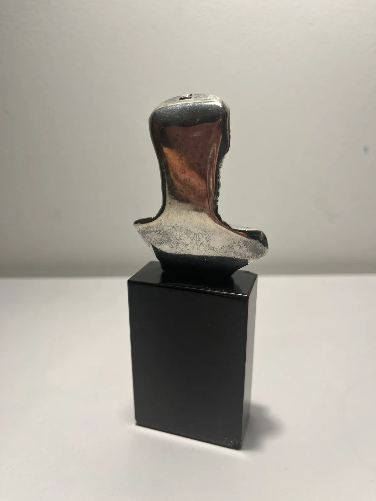Petit Prométhée Argent — profile view, Igor Mitoraj