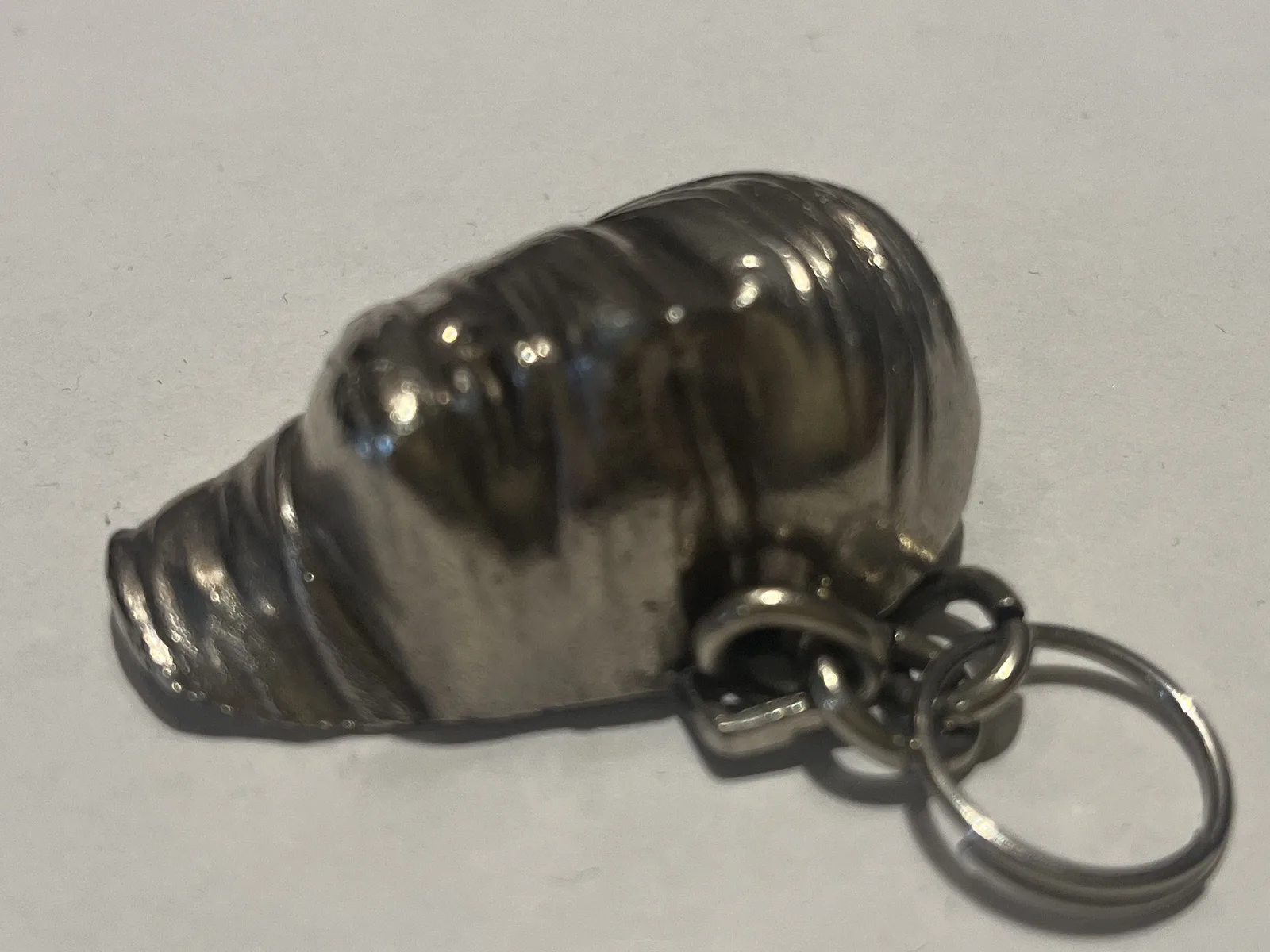 Testa Addormentata — Mitoraj Amnesty International silver pendant additional angle