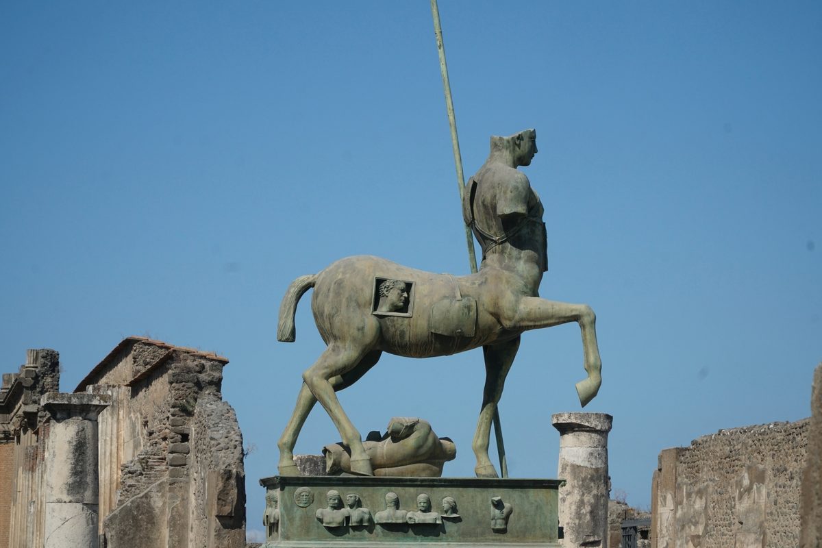 Centauro bronze sculpture by Mitoraj, Pompeii ruins